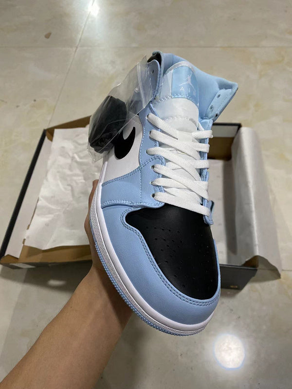 Jordan 1 mid blue and  White