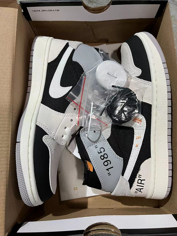 Jordan 1 Mid    black and white