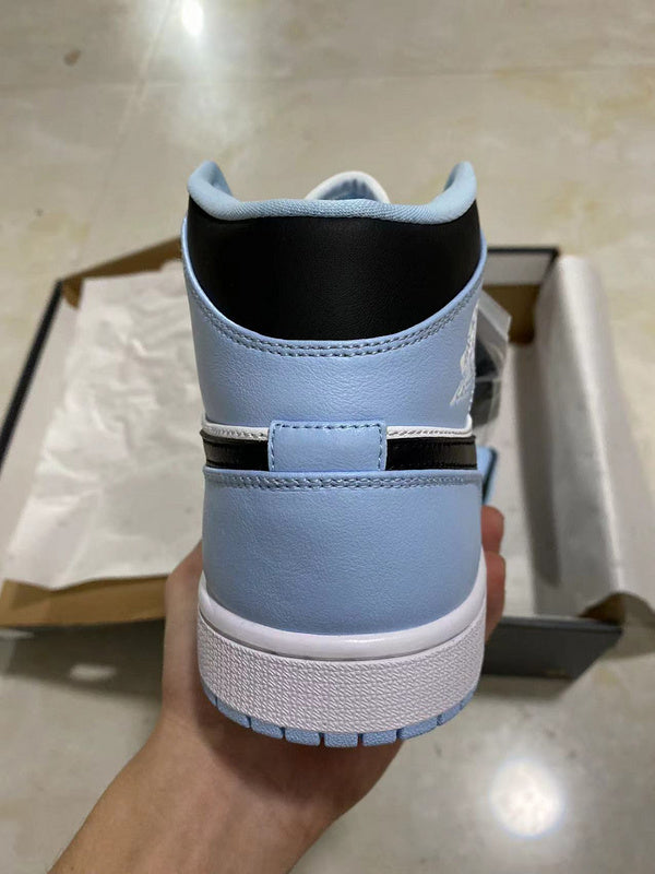 Jordan 1 mid blue and  White