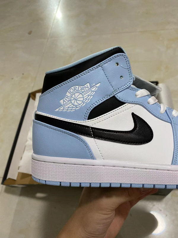 Jordan 1 mid blue and  White