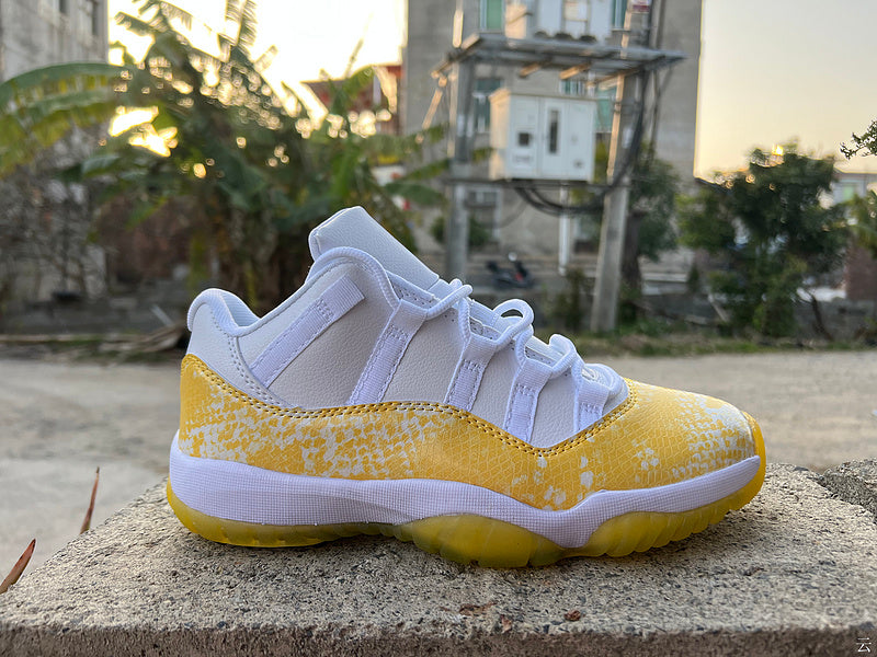 Air Jordan 11 Retro Low White/Tour Yellow.