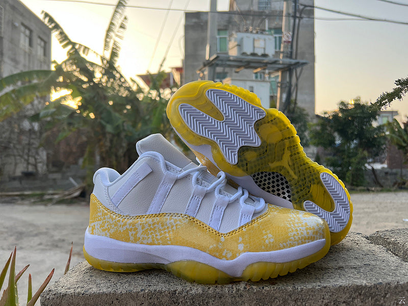 Air Jordan 11 Retro Low White/Tour Yellow.