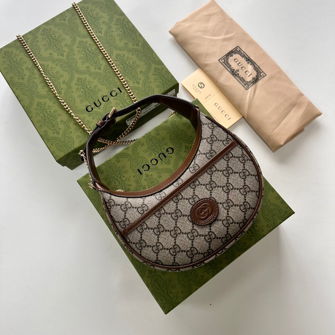 Gucci HALF-MOON-SHAPED MINI BAG WITH INTERLOCKING G